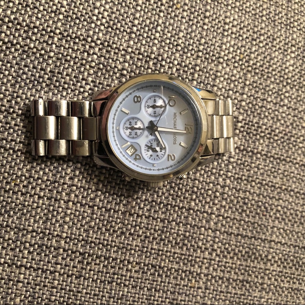 Micheal Kors baby blue and silver watch